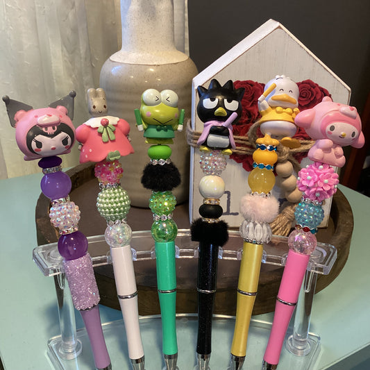 beaded doorables/ figures pens