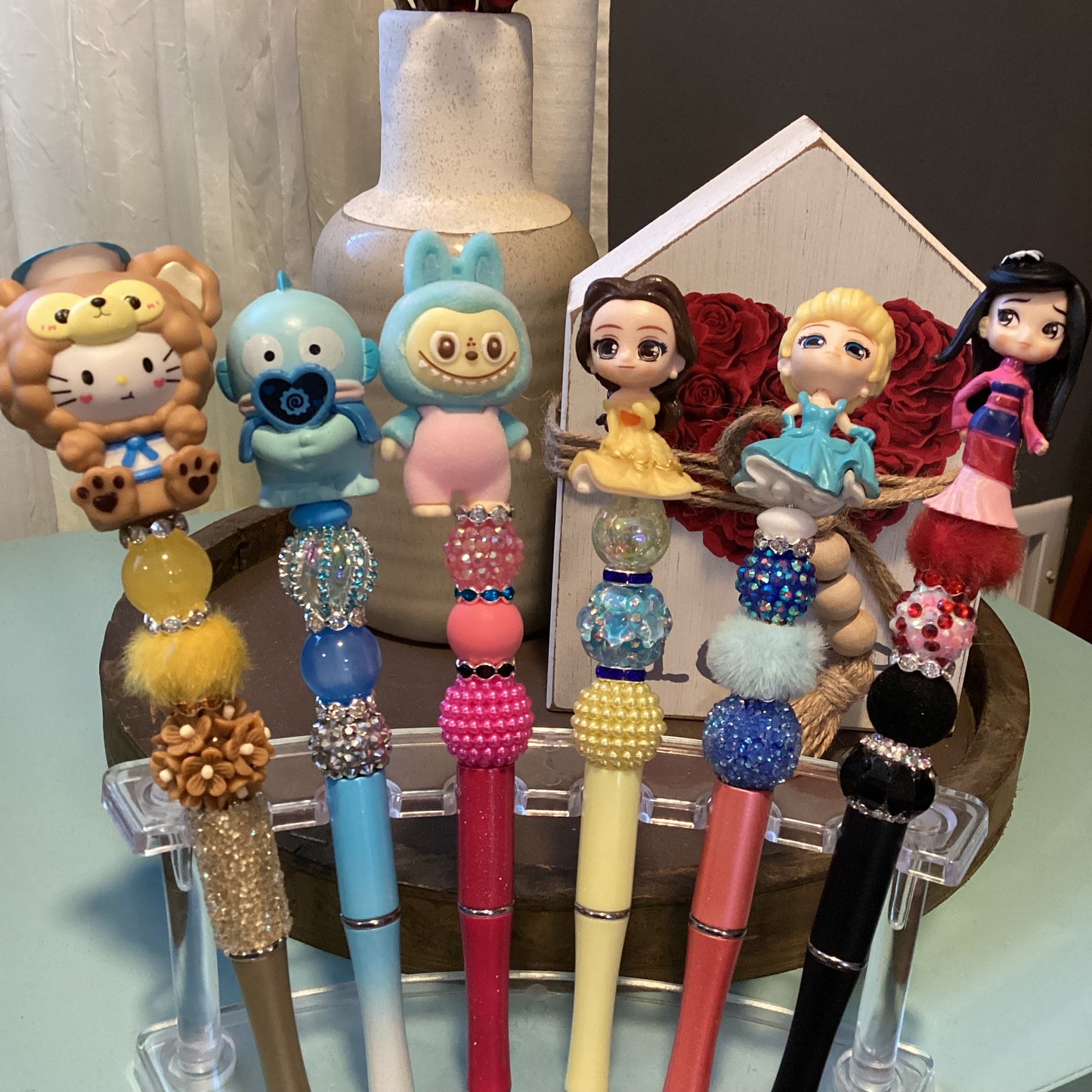 beaded doorables/ figures pens