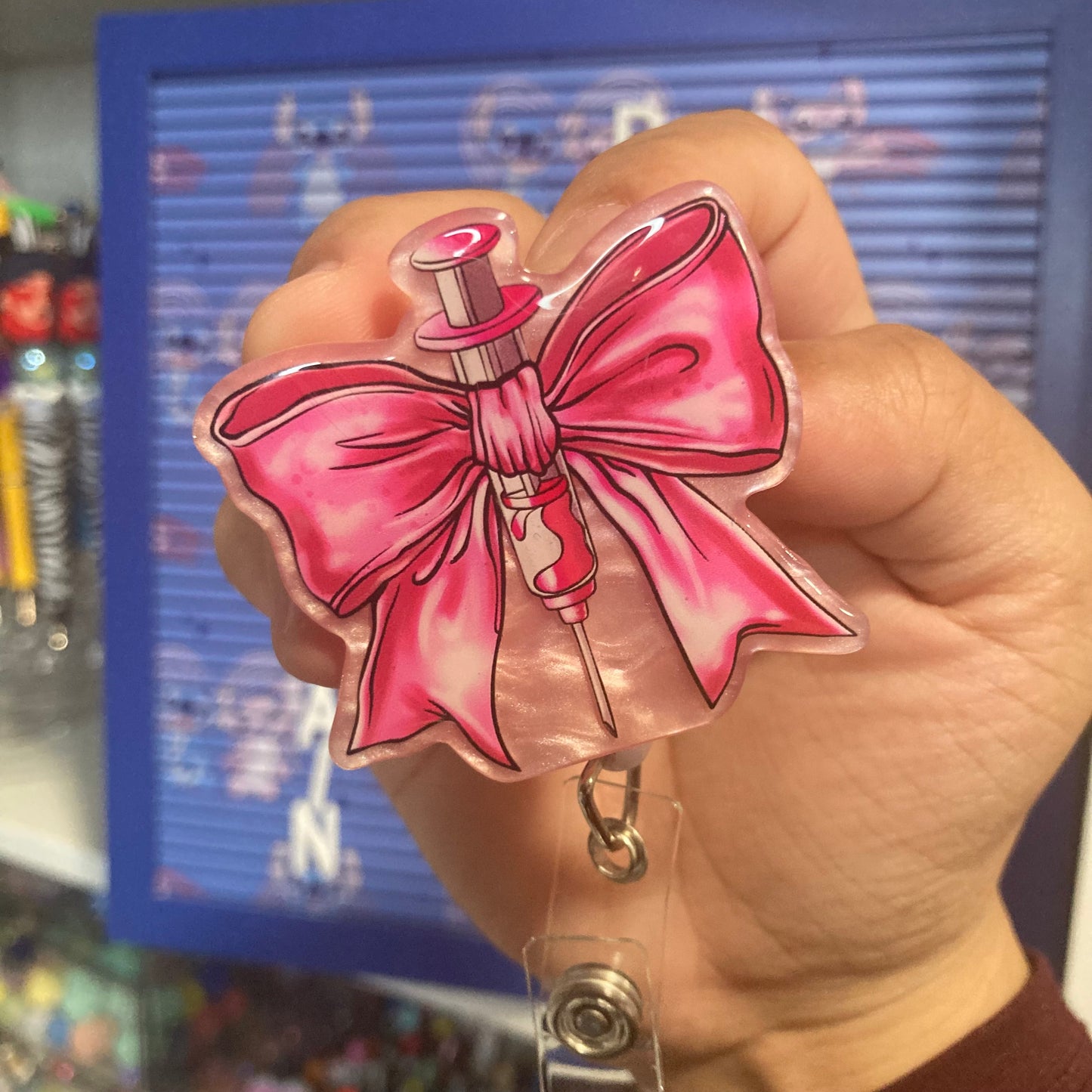 Bow Syringe Badge Reel