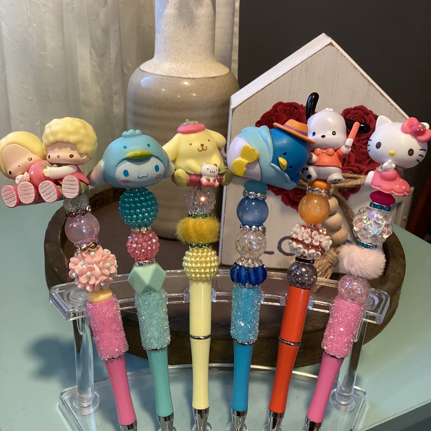 beaded doorables/ figures pens
