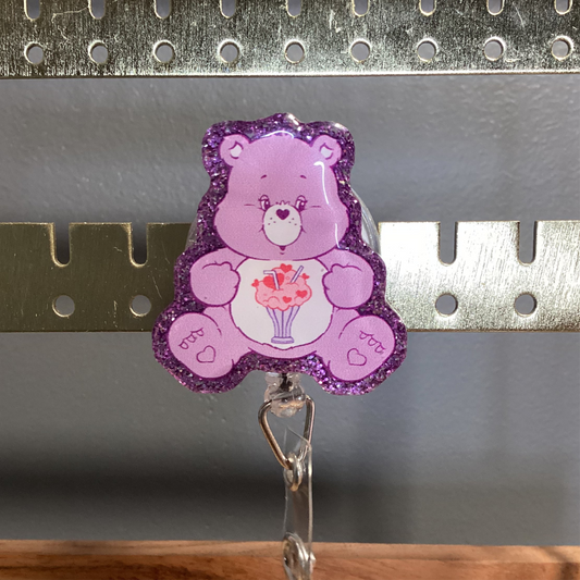 Purple Care Bear Badge Reel