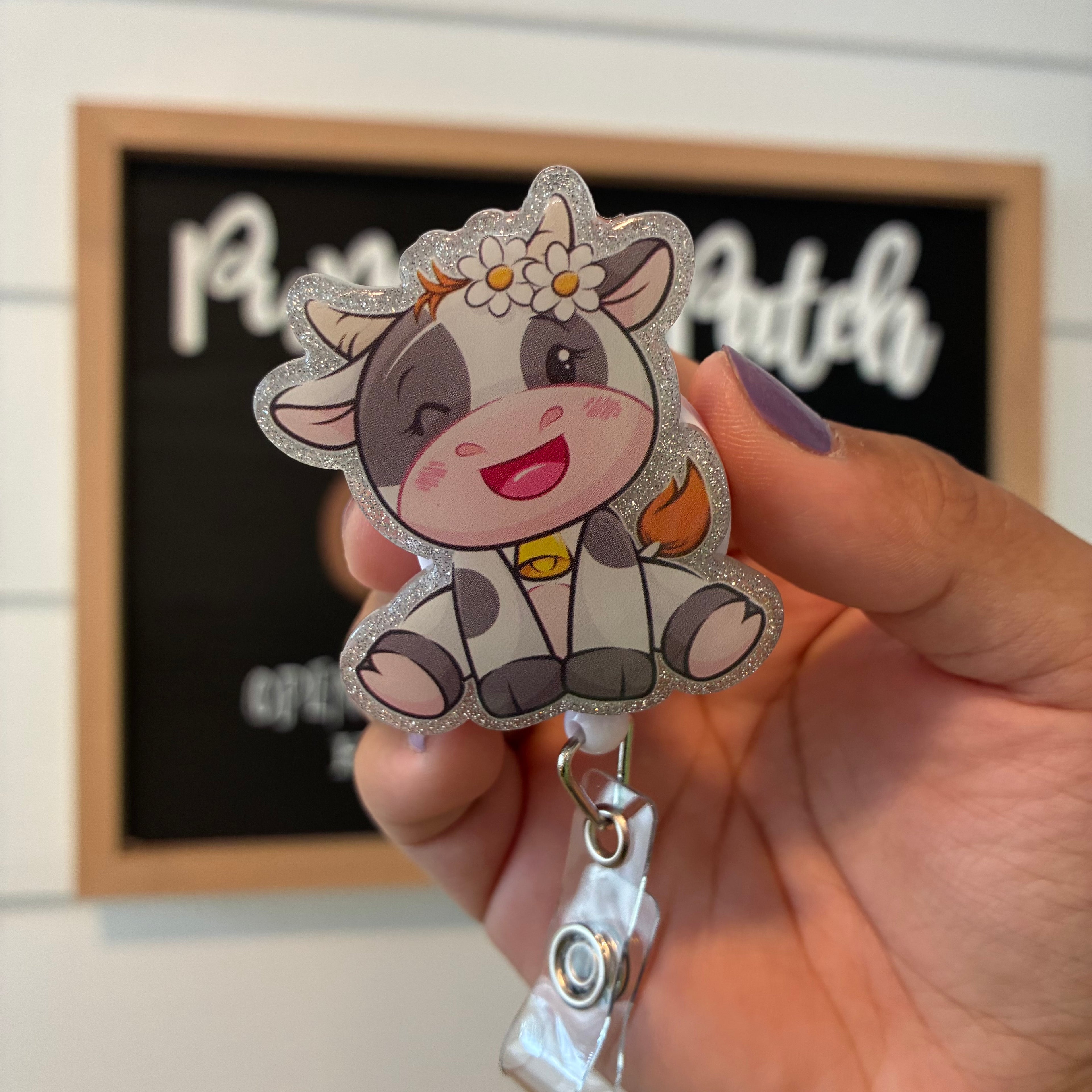 Sitting Cow Badge Reel