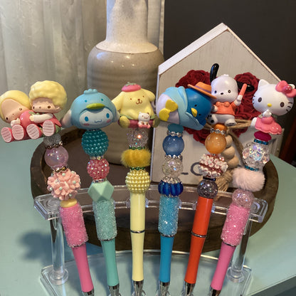 beaded doorables/ figures pens