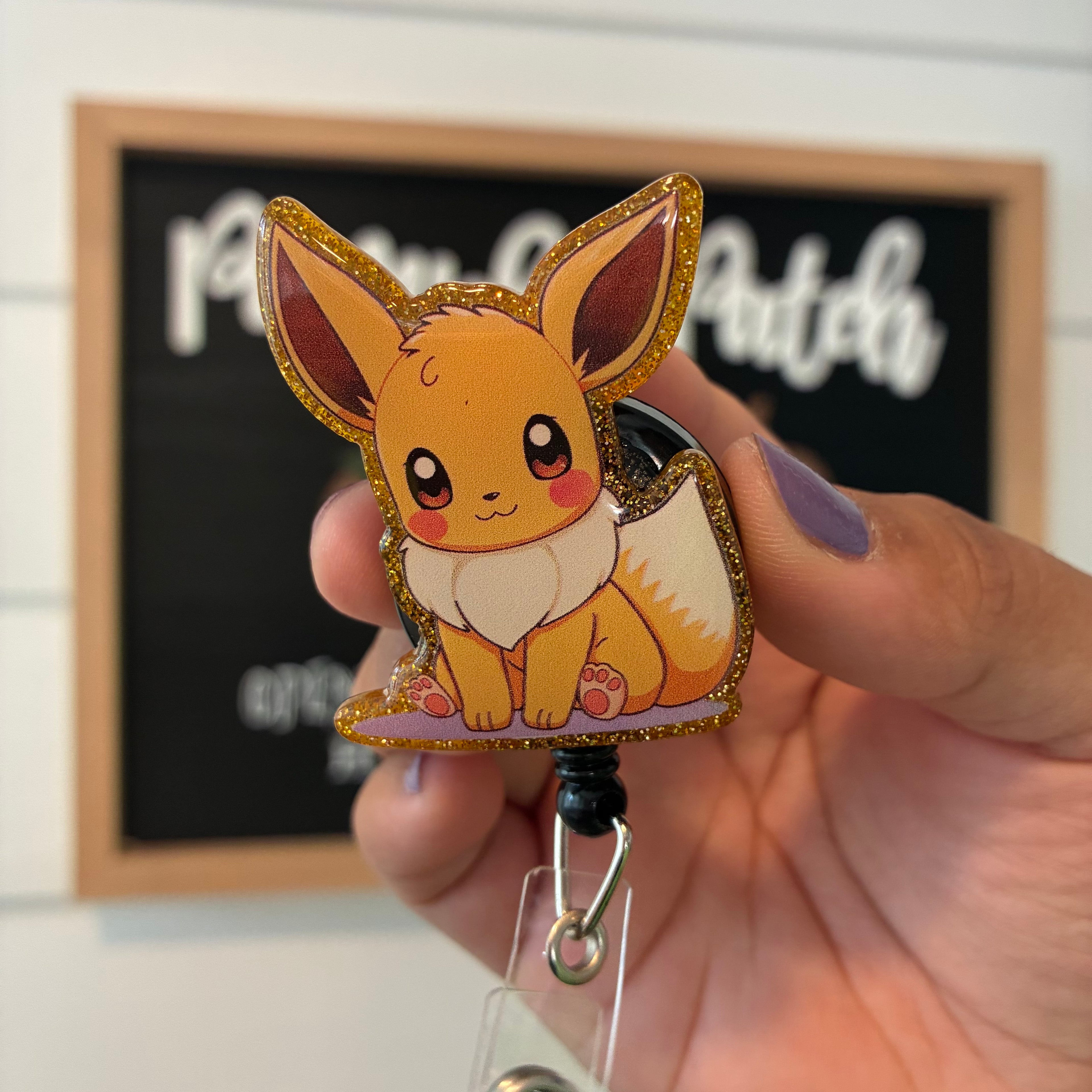 Eevee Badge Reel
